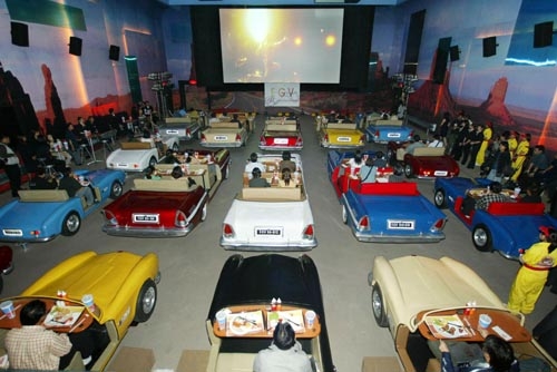 PATRONS ENJOY THE COUNTRY'S FIRST " DRIVE IN " CINEMA AND CAFE  IN BANGKOK